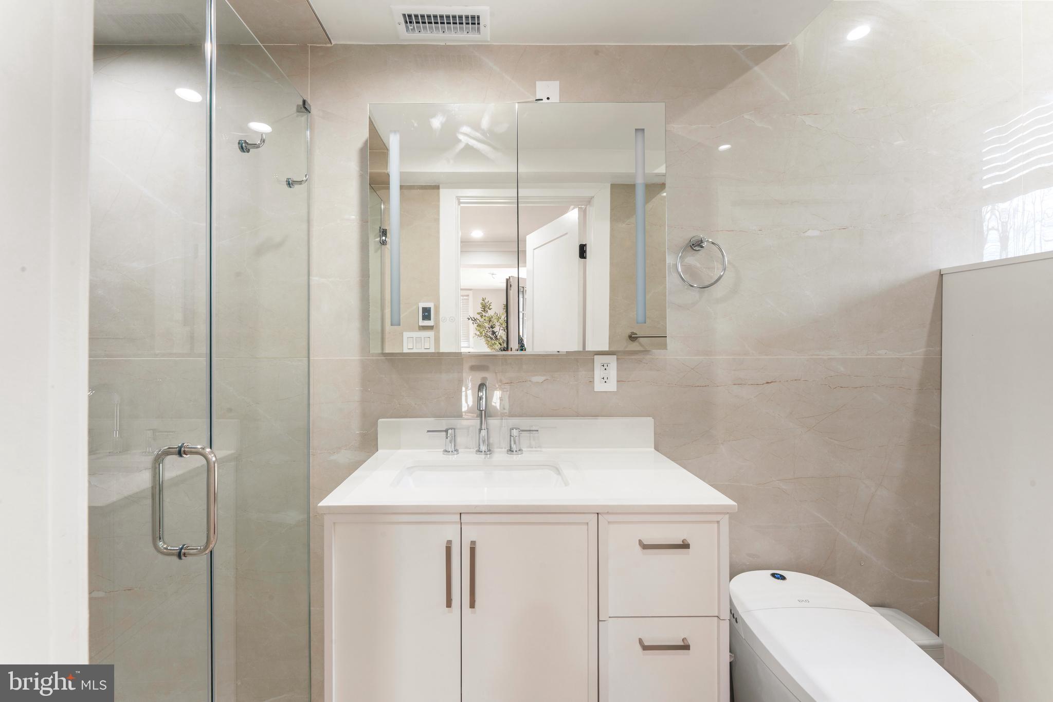 528 Hoyt Road Huntingdon Valley, PA 19006 - Photo 45 of 56 a bathroom with a sink a toilet and shower