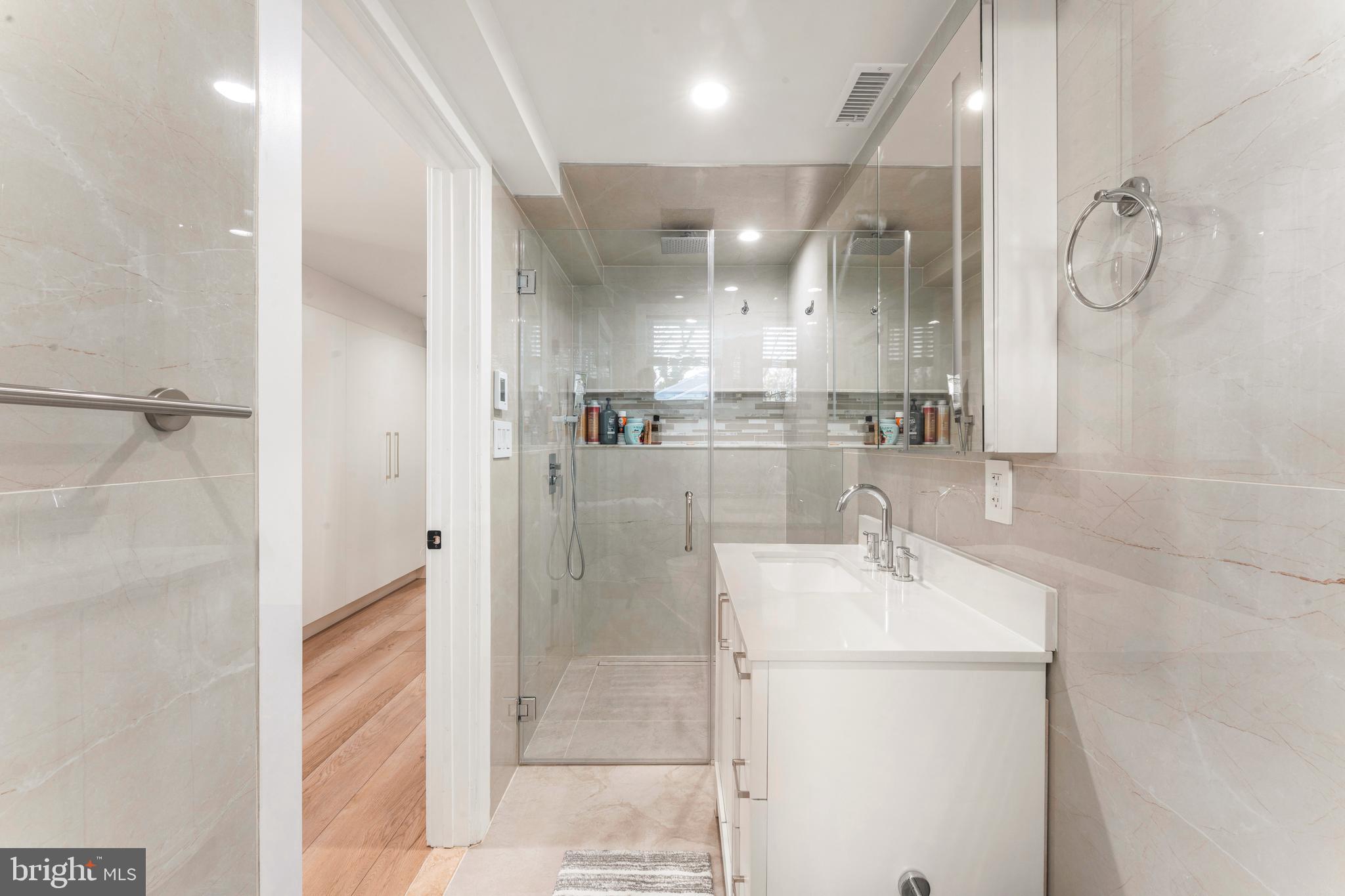 528 Hoyt Road Huntingdon Valley, PA 19006 - Photo 46 of 56 a bathroom with a double vanity sink mirror and shower