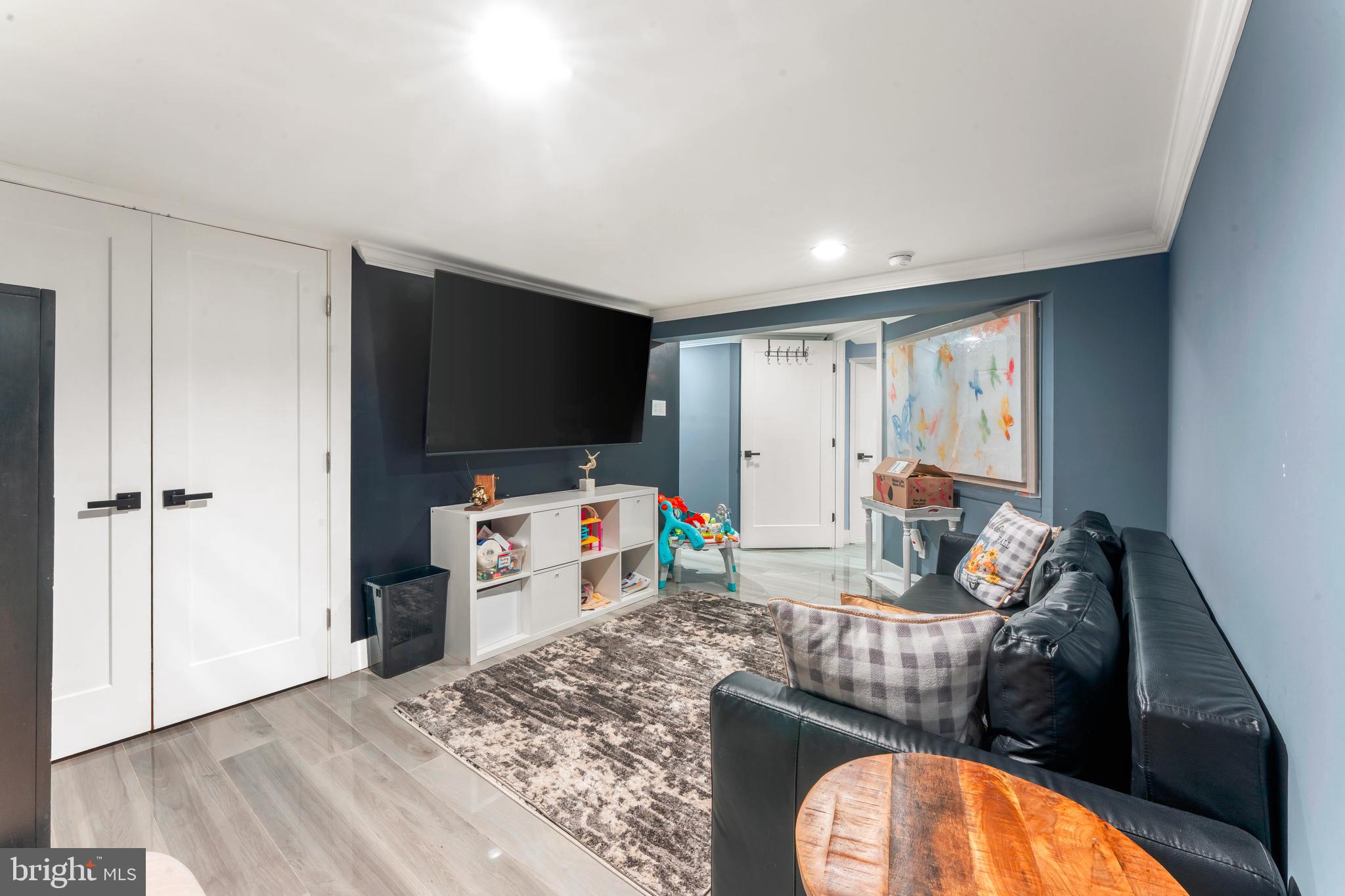 528 Hoyt Road Huntingdon Valley, PA 19006 - Photo 47 of 56 a living room with furniture and a flat screen tv