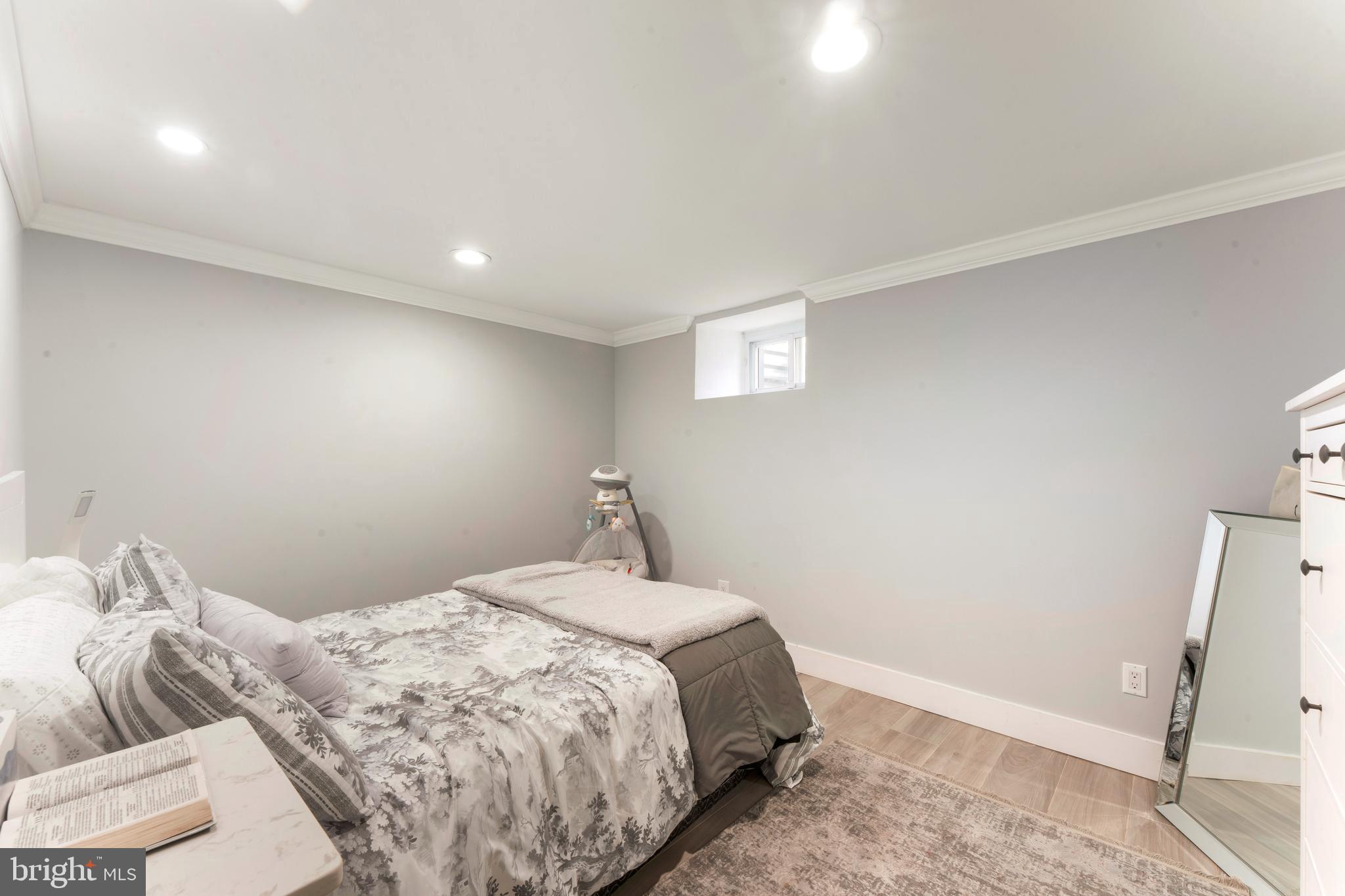 528 Hoyt Road Huntingdon Valley, PA 19006 - Photo 49 of 56 a bedroom with a bed and a window