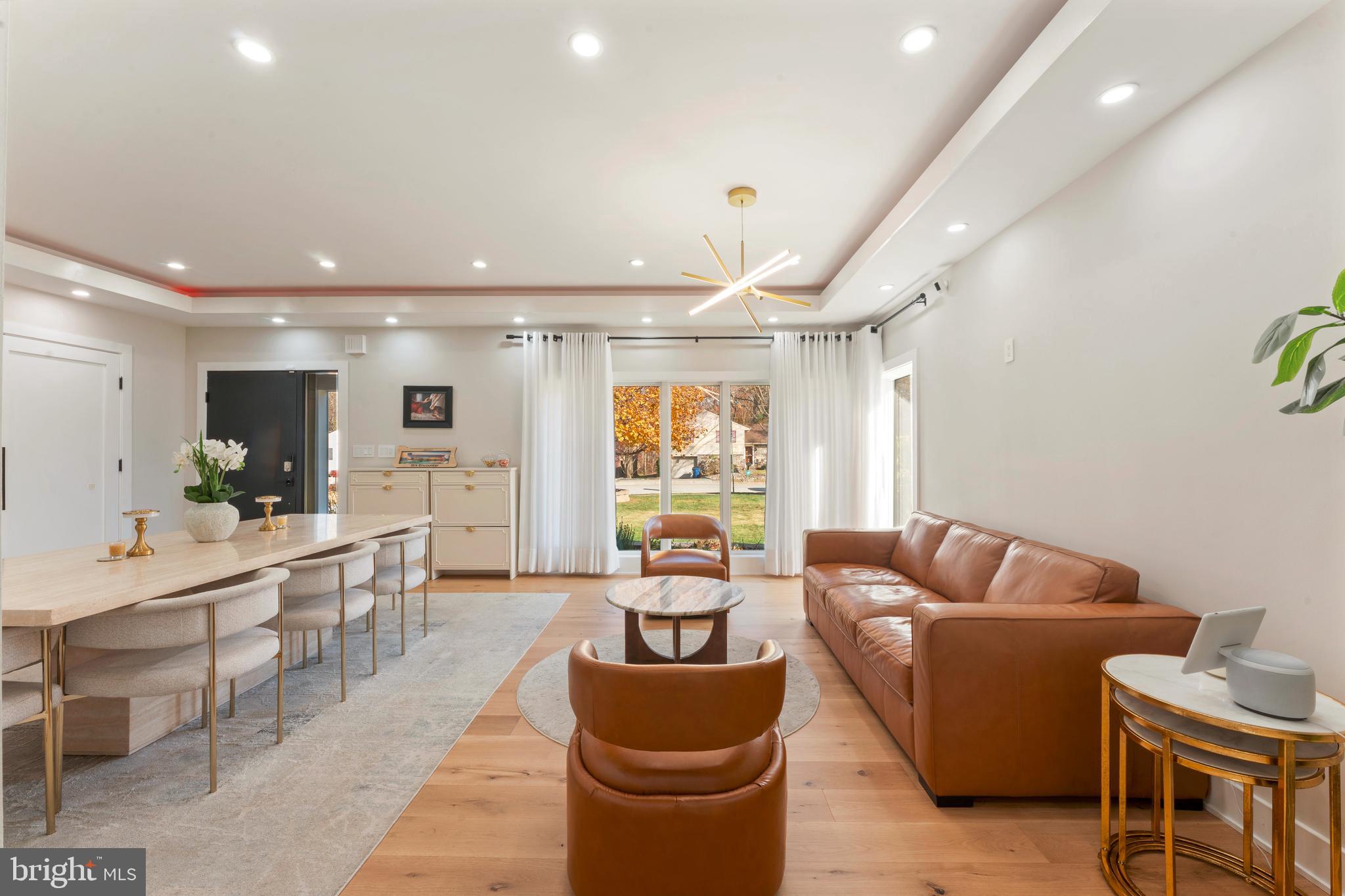 528 Hoyt Road Huntingdon Valley, PA 19006 - Photo 9 of 56 a living room with furniture and a flat screen tv