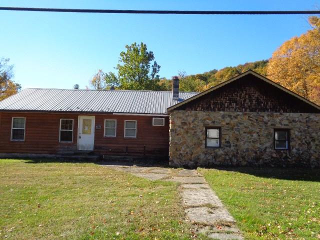 8178 State Rte 55 Grahamsville, NY 12740 - Photo 1 of 1 a front view of a house with garden