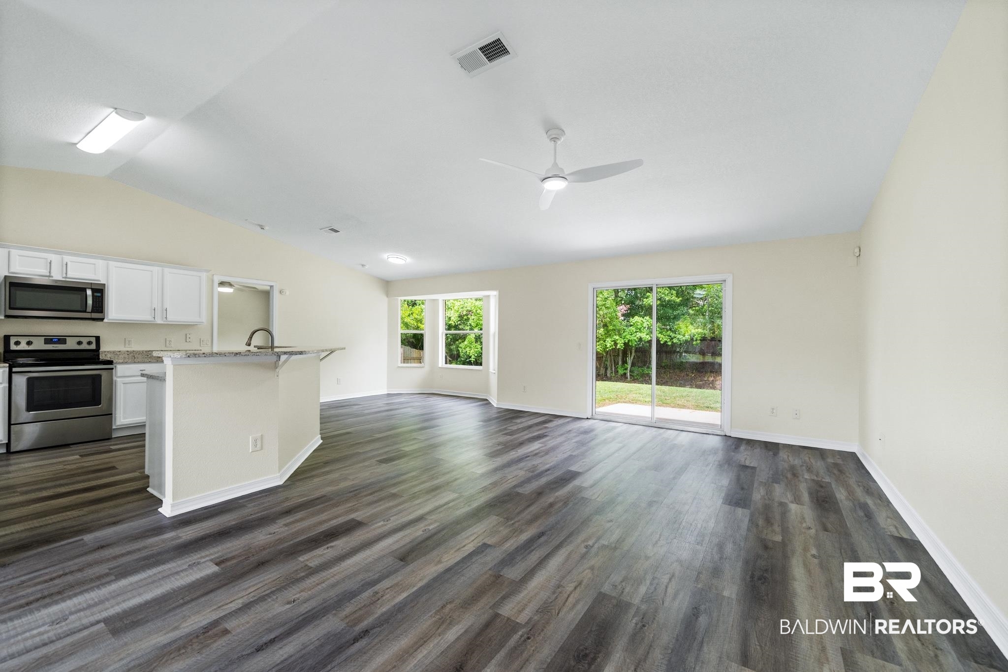 235 Woodsong Drive Foley, AL 36535 - Photo 7 of 25 Living/Dining area