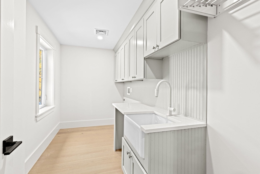 7 Lewis Court Hingham, MA 02043 - Photo 32 of 42 a view of storage and utility room with a sink