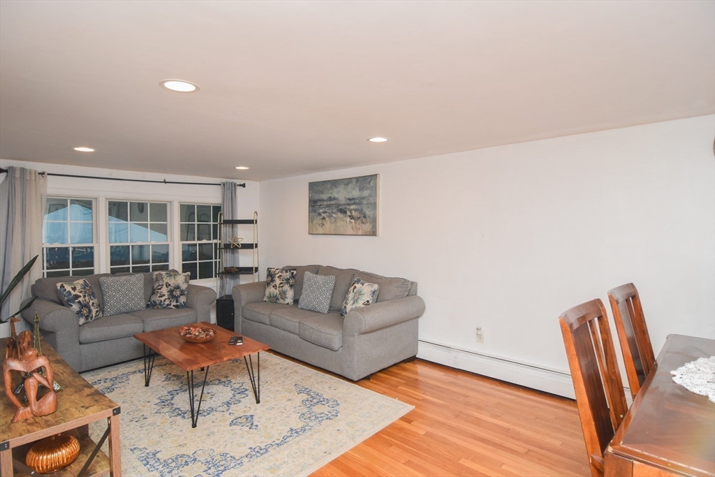 9 Topping Road Andover, MA 01810 - Photo 17 of 41 a living room with furniture a rug and a large window
