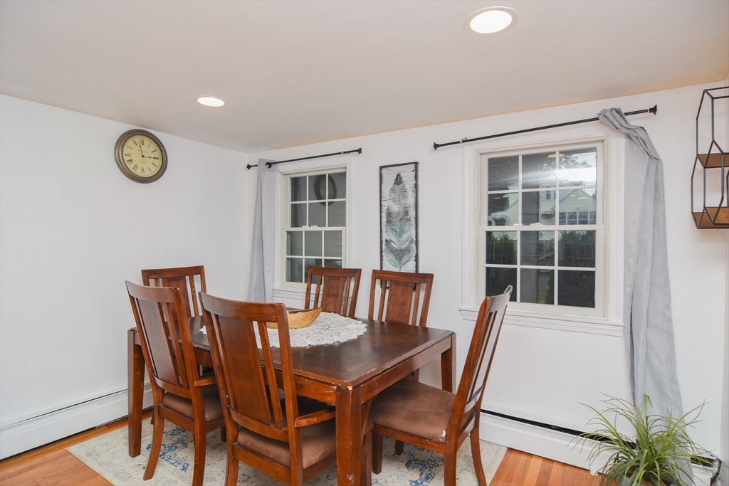 9 Topping Road Andover, MA 01810 - Photo 18 of 41 a view of a dining room with furniture and a window