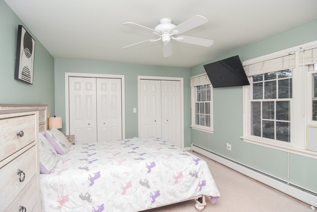 9 Topping Road Andover, MA 01810 - Photo 26 of 41 a bedroom with a large bed and a window