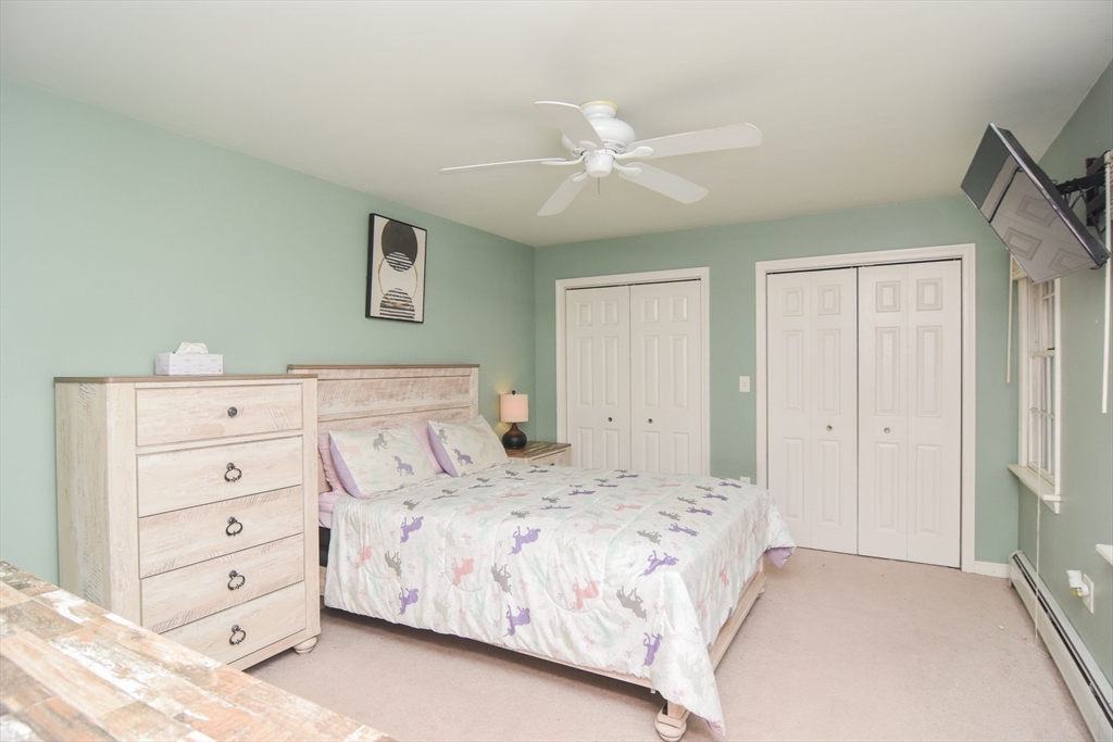 9 Topping Road Andover, MA 01810 - Photo 27 of 41 a bedroom with a large bed and a window
