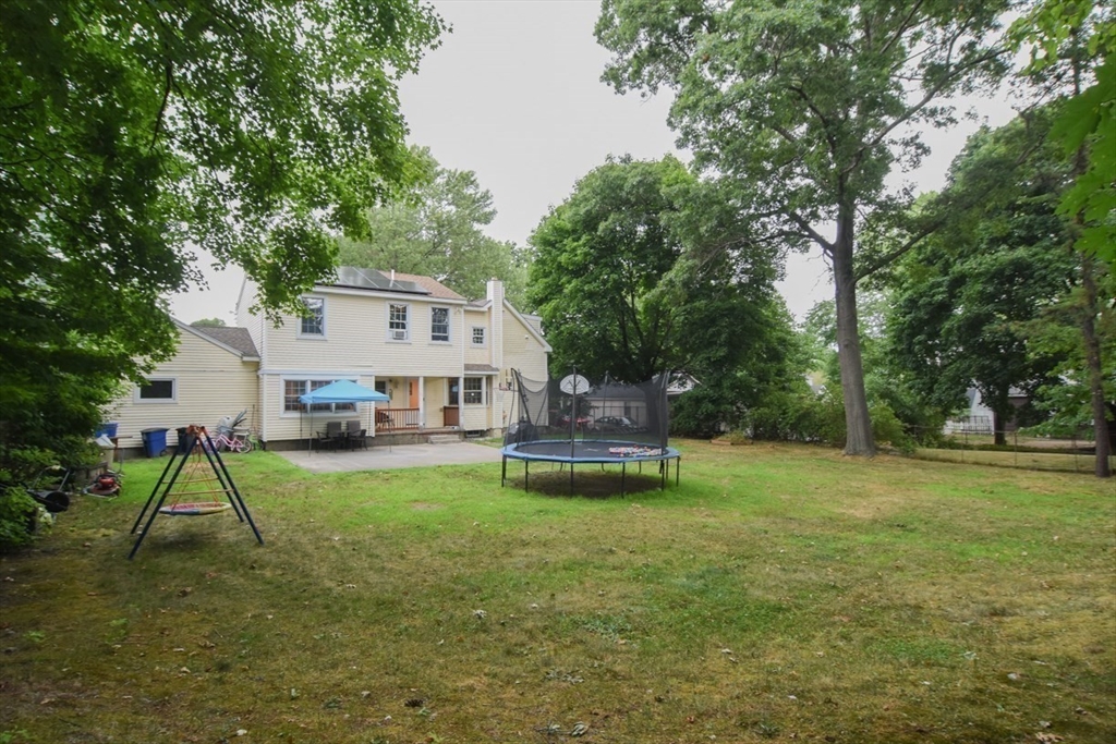 9 Topping Road Andover, MA 01810 - Photo 41 of 41 a view of a house with a yard porch and sitting area
