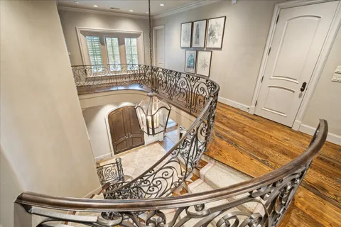 a view of a balcony with chairs