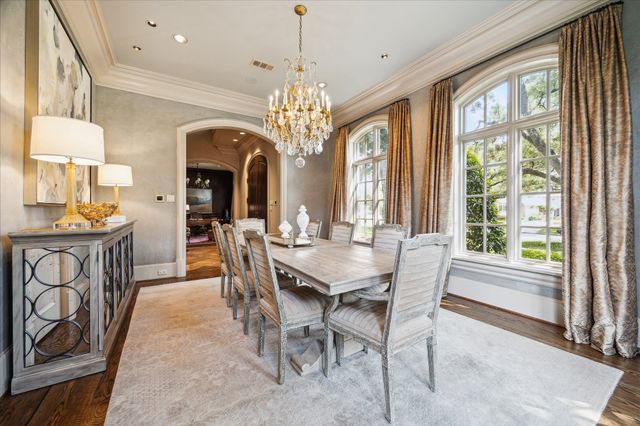 a view of a a dining room with furniture window and outside view