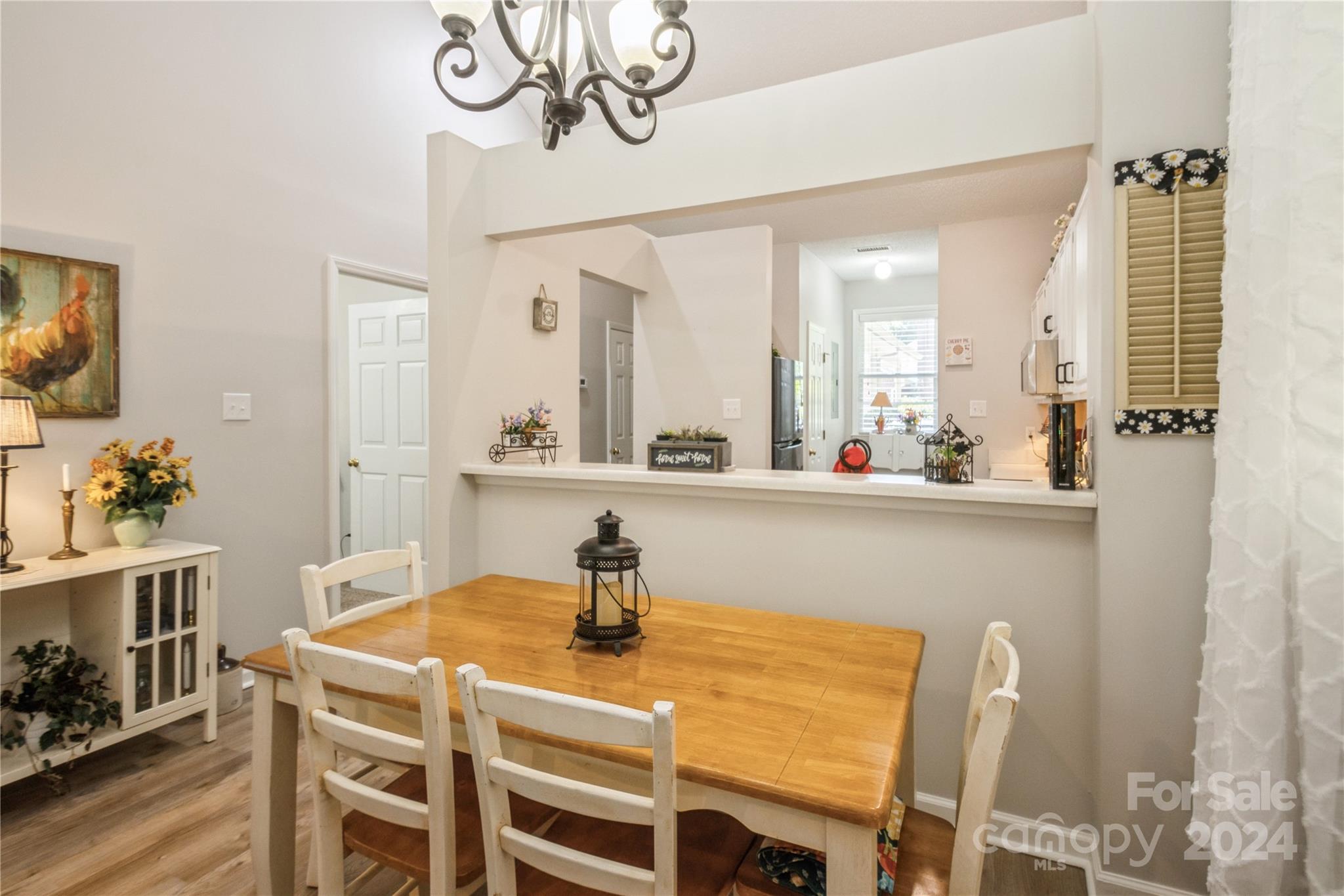 19960 Oak Leaf Circle Cornelius, NC 28031 - Photo 16 of 35 a dining room with furniture and window