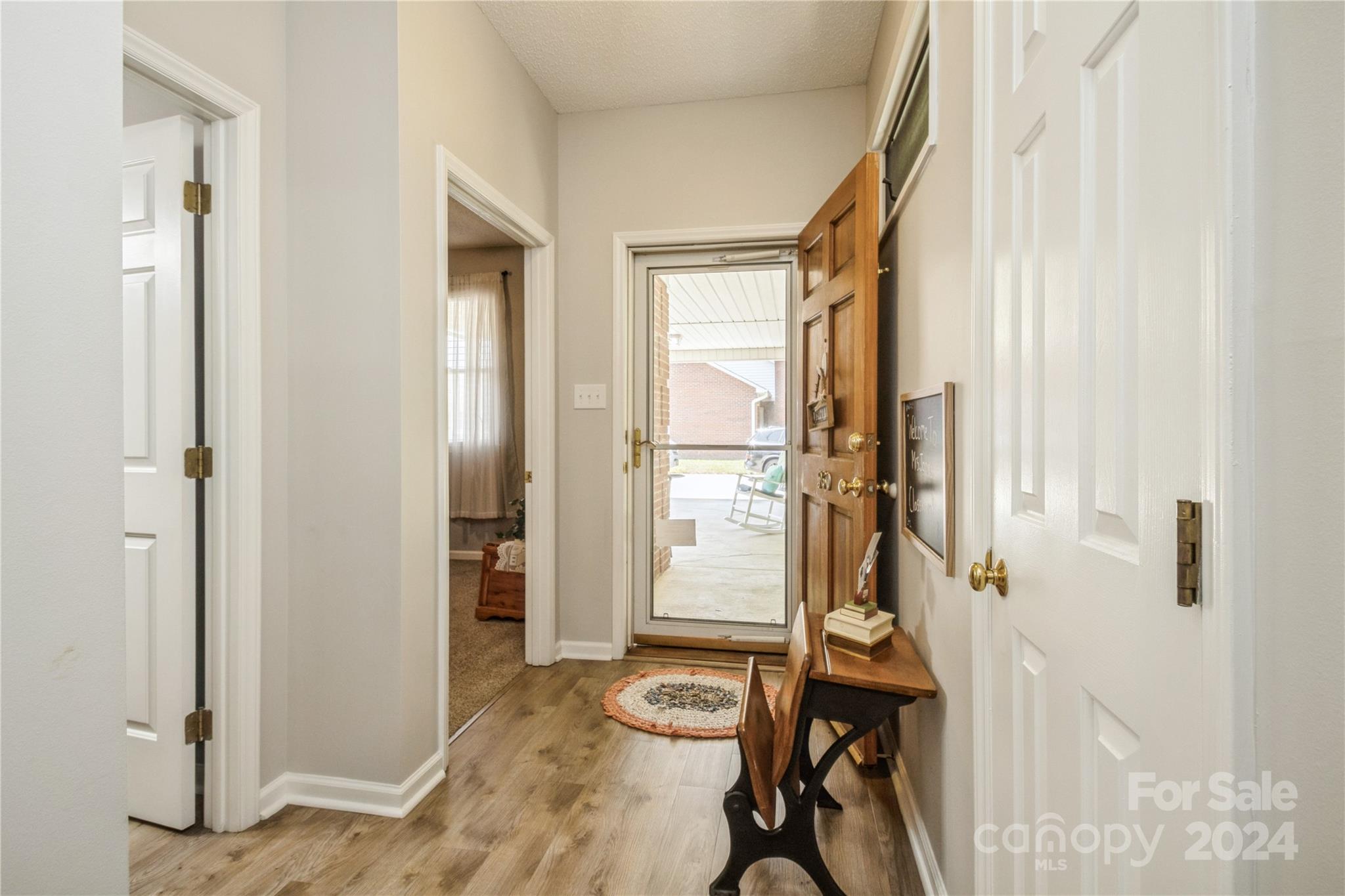 19960 Oak Leaf Circle Cornelius, NC 28031 - Photo 5 of 35 a view of entryway with livingroom and furniture