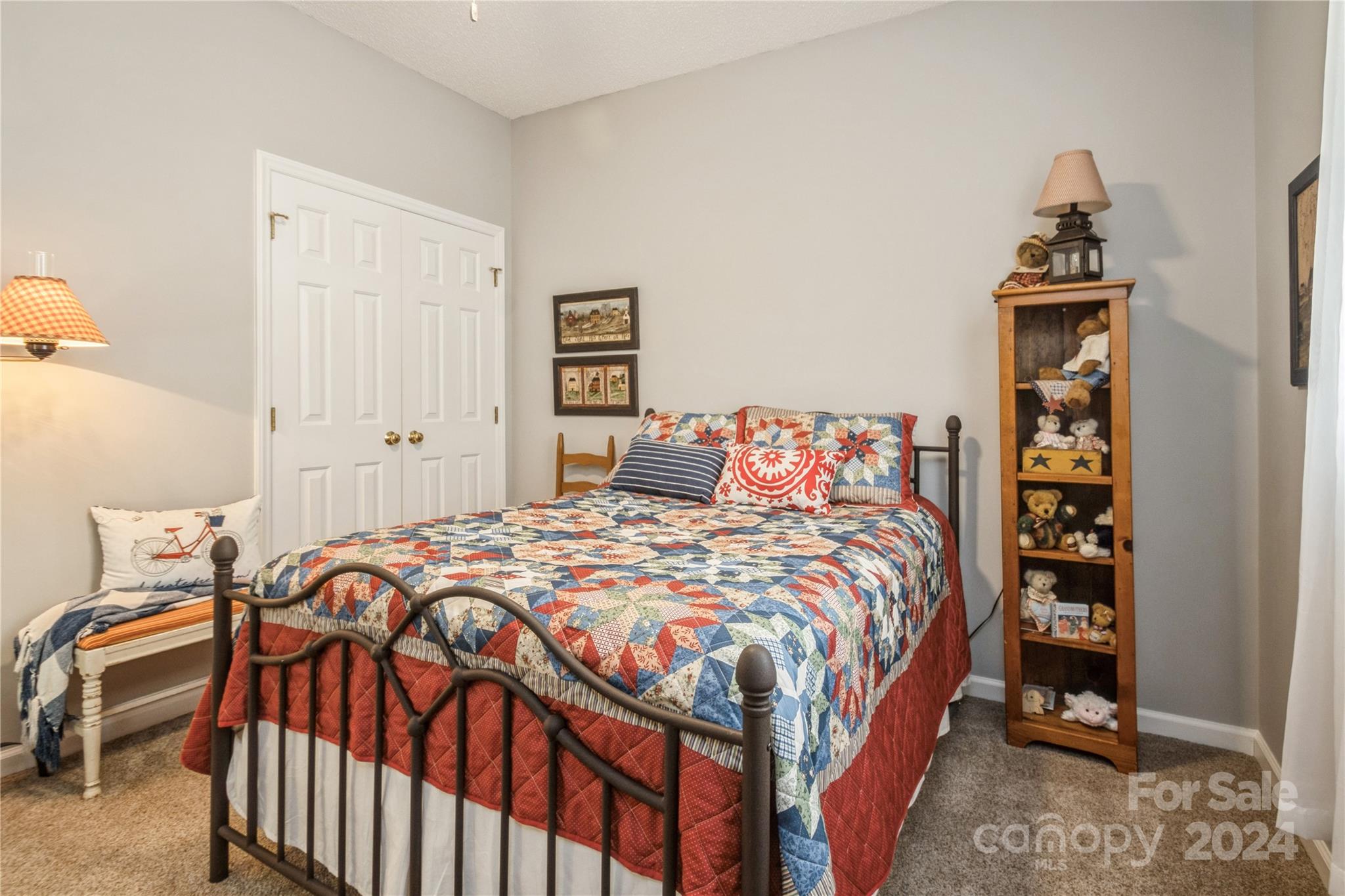 19960 Oak Leaf Circle Cornelius, NC 28031 - Photo 7 of 35 a bedroom with a bed and a dresser