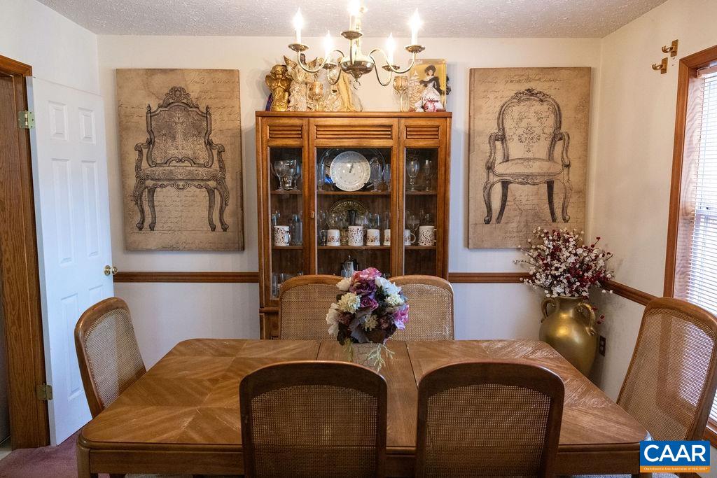 5705 Louisa Road Keswick, VA 22947 - Photo 6 of 19 a dining room with furniture and window