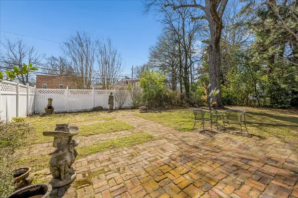 a view of a swimming pool with an outdoor space