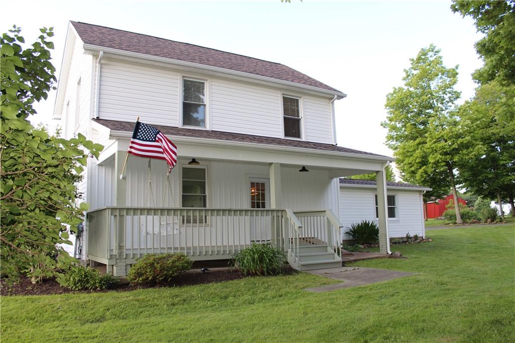 354 Airport Road Mercer, PA 16137 - Photo 1 of 25 a view of a house with a yard and plants