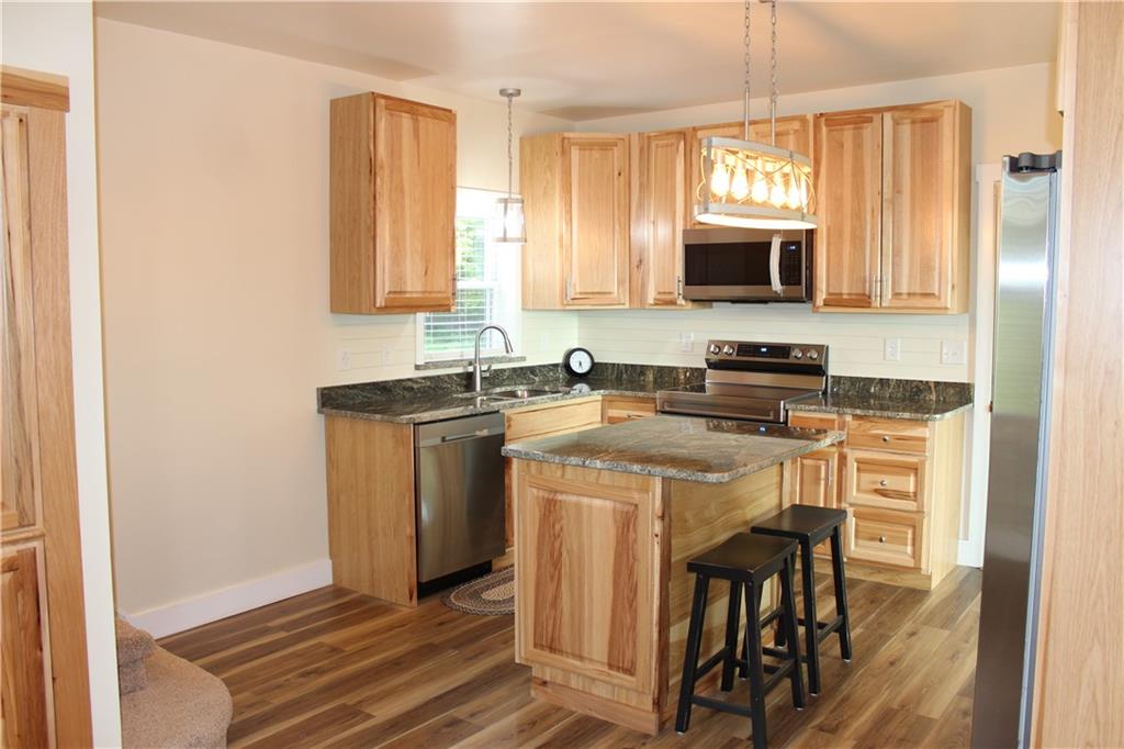 354 Airport Road Mercer, PA 16137 - Photo 8 of 25 a kitchen with a sink cabinets and window