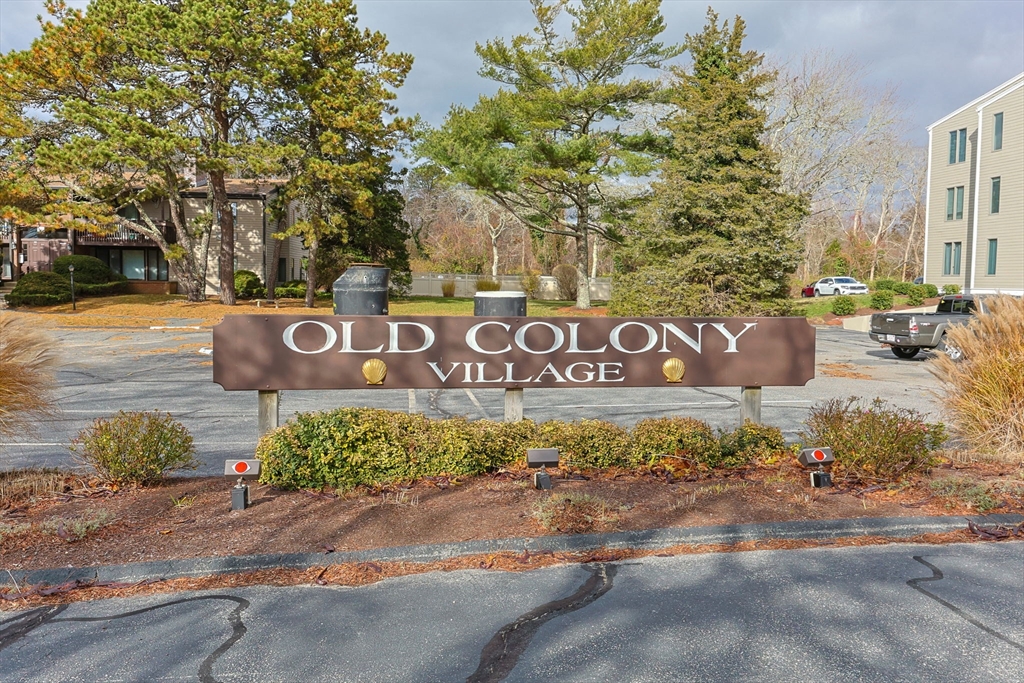 42 Old Colony Way, Unit 28 Orleans, MA 02653 - Photo 31 of 35 a view of outdoor space with sign board