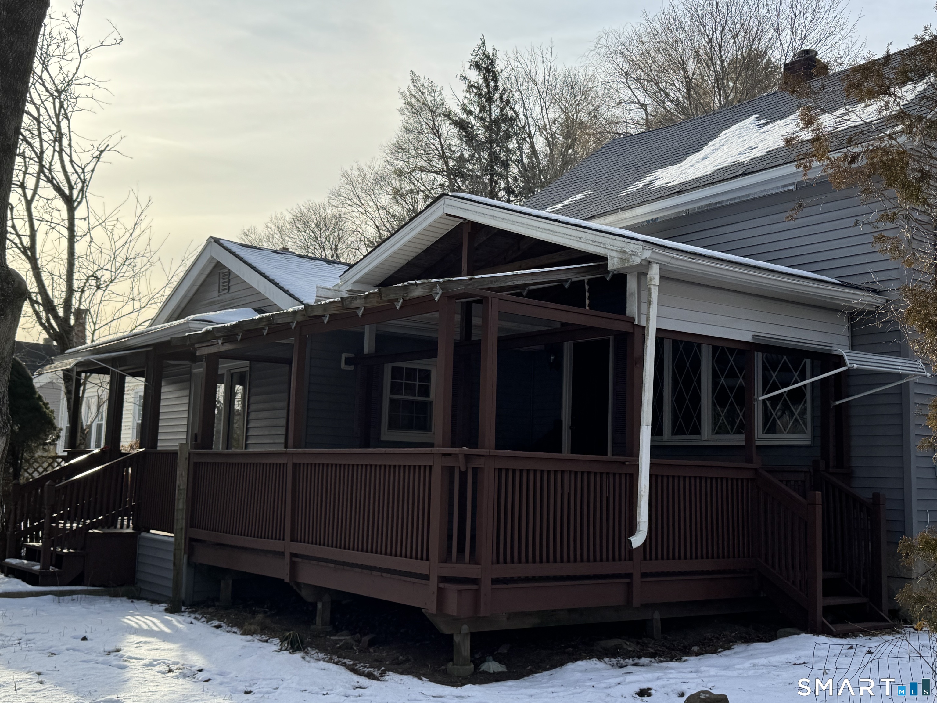 23 High Street Plainfield, CT 06354 - Photo 20 of 22 a view of wooden house with a large window and wooden fence