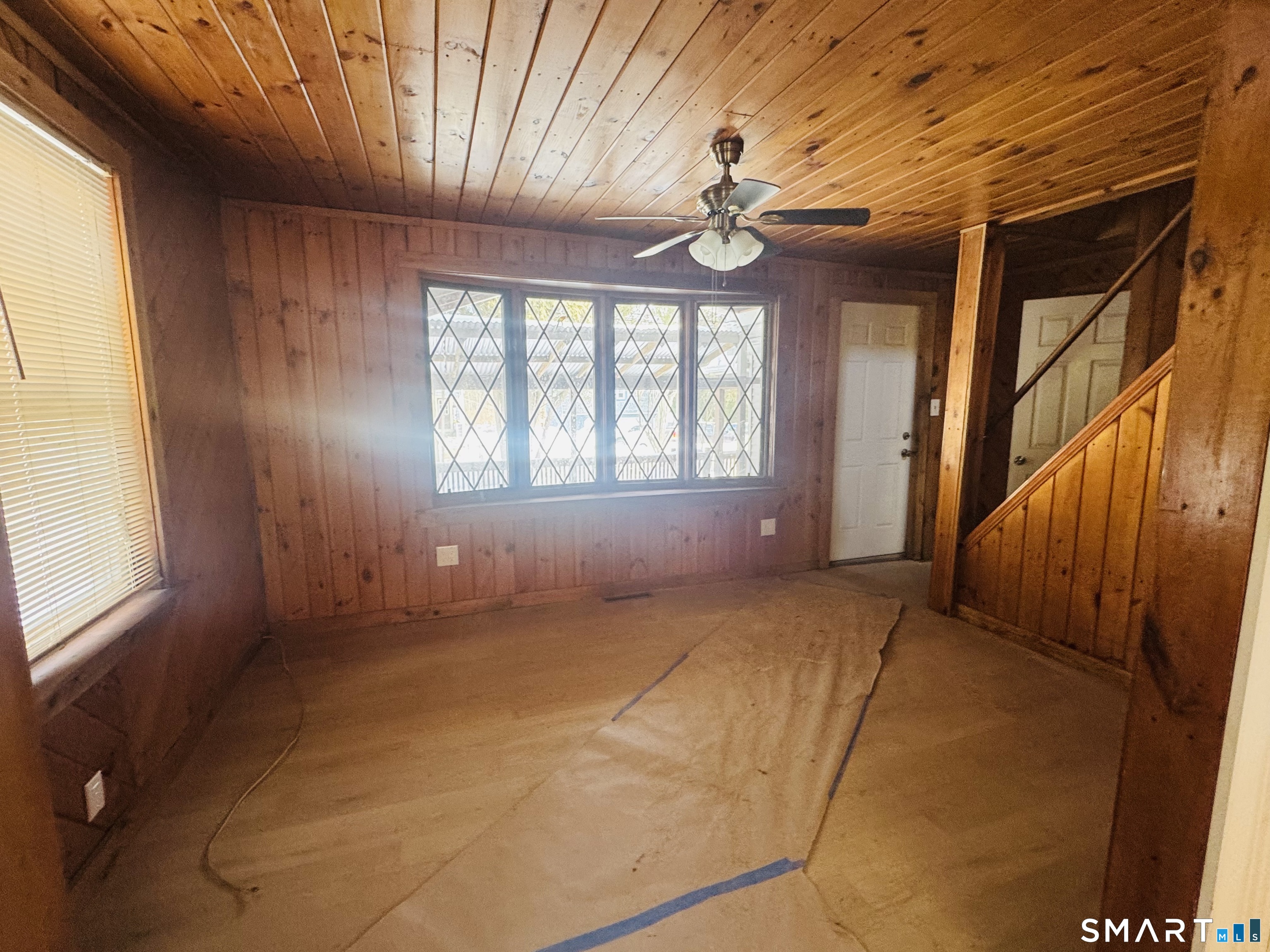 23 High Street Plainfield, CT 06354 - Photo 6 of 22 a view of an empty room with a window