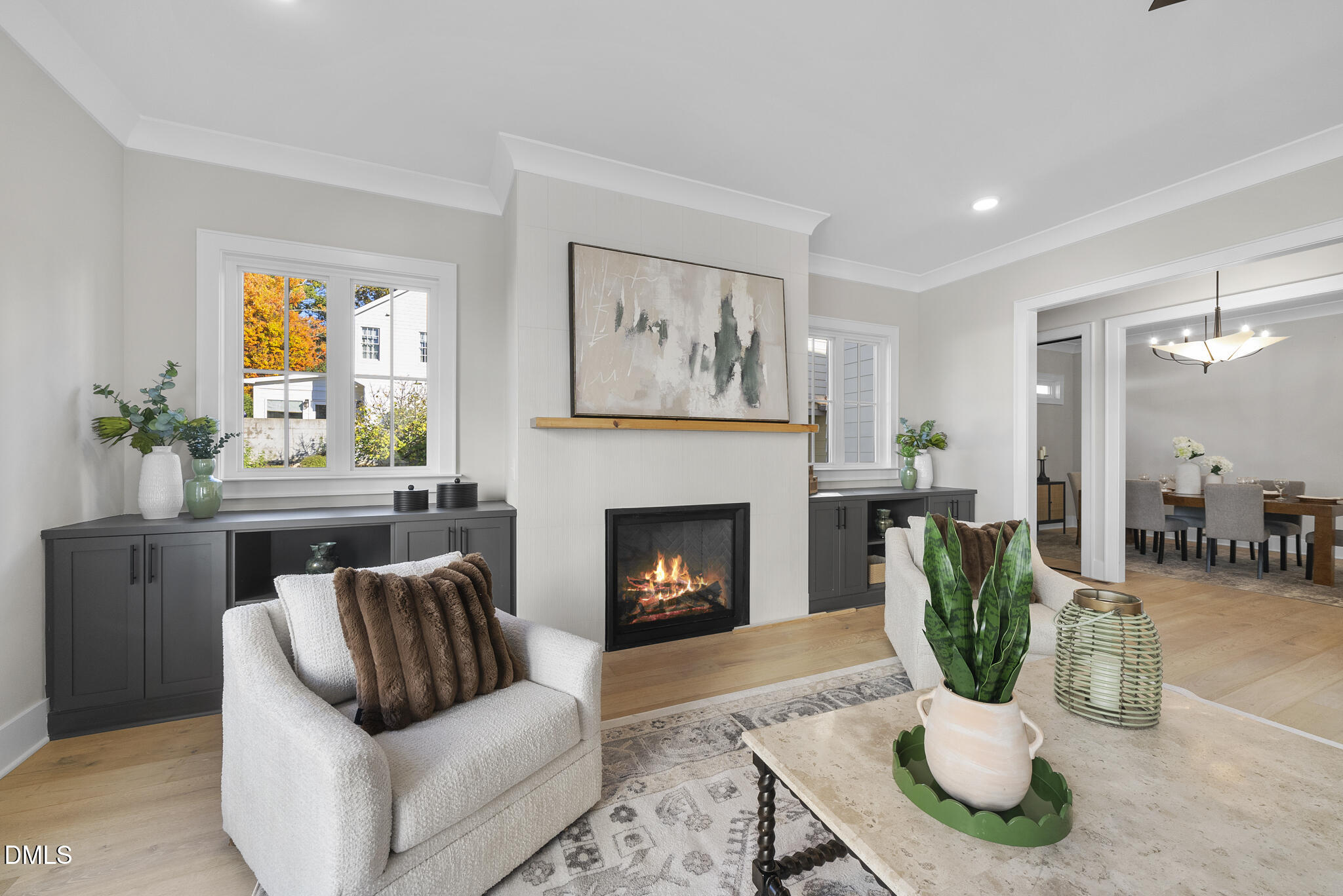 1003 Canterbury Road Raleigh, NC 27607 - Photo 13 of 45 a living room with furniture and a fireplace