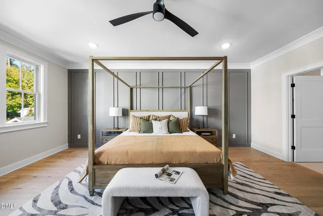 a bathroom with double sink and a mirror