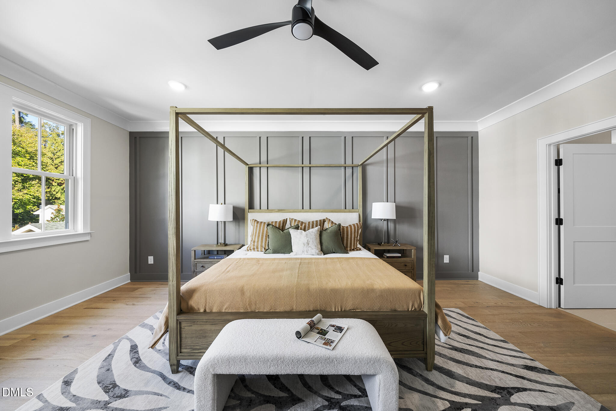 1003 Canterbury Road Raleigh, NC 27607 - Photo 16 of 45 a bedroom with a bed and a table