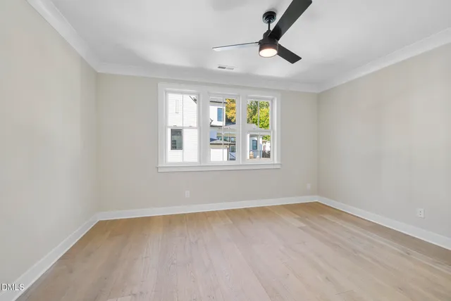 a view of kitchen with sink and cabinets