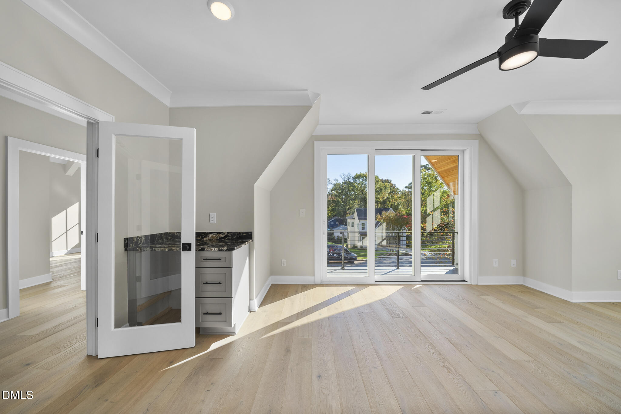 1003 Canterbury Road Raleigh, NC 27607 - Photo 36 of 45 wooden floor in an empty room with a window