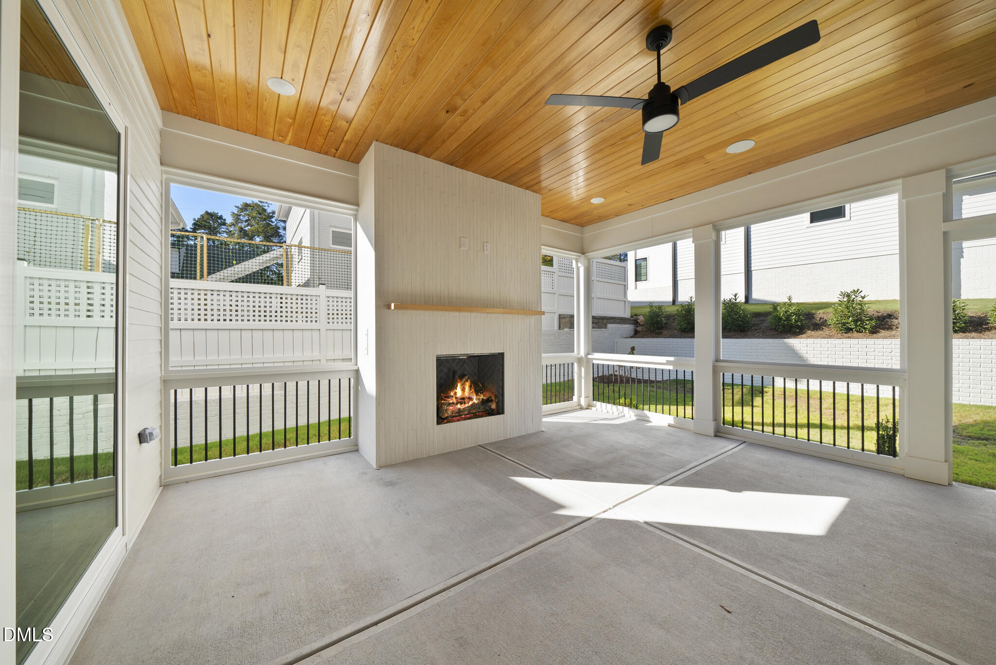 1003 Canterbury Road Raleigh, NC 27607 - Photo 41 of 45 a view of an empty room with a fireplace