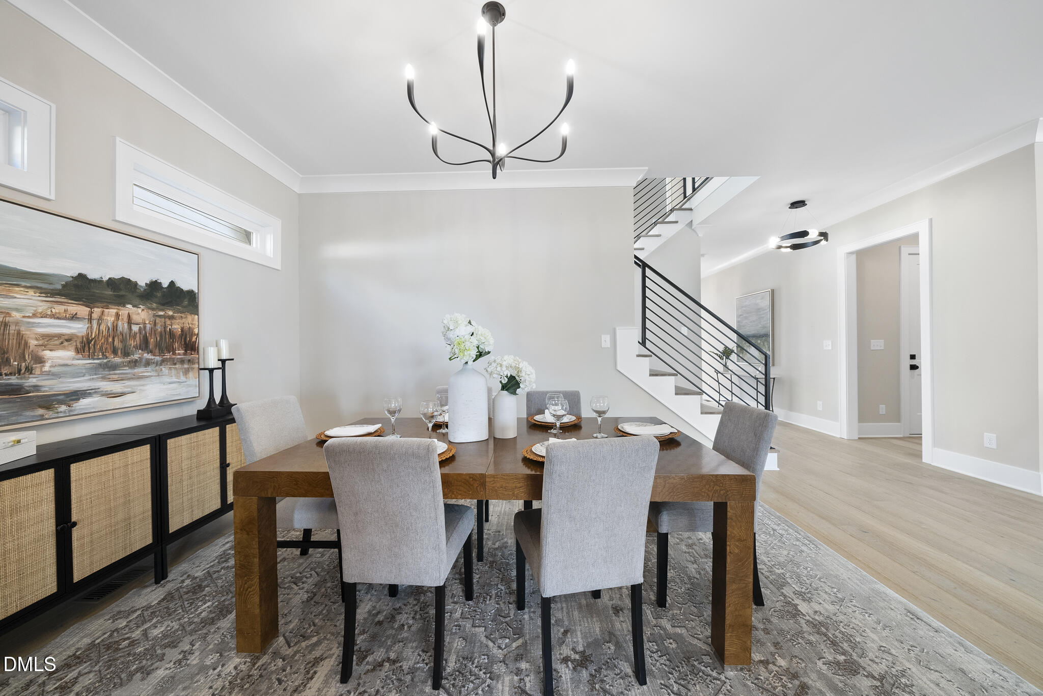 1003 Canterbury Road Raleigh, NC 27607 - Photo 10 of 45 a view of a dining room with furniture window and wooden floor