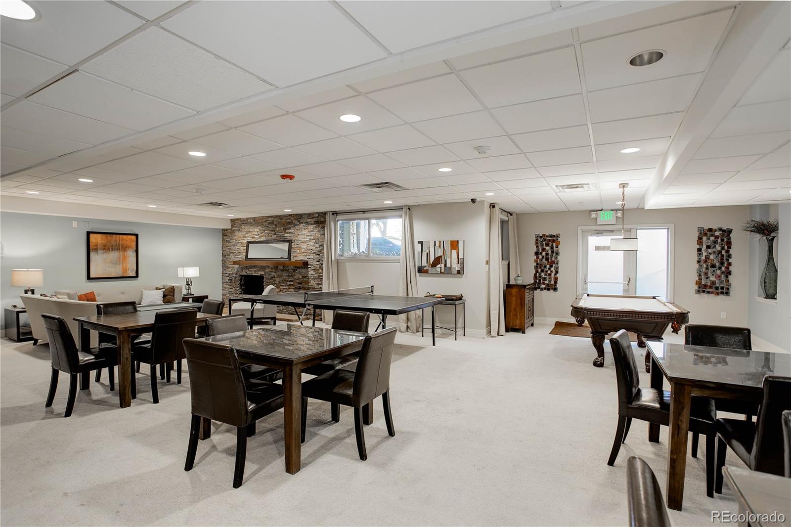 2 Adams Street, Unit 1401 Denver, CO 80206 - Photo 18 of 21 a view of a dining area with furniture