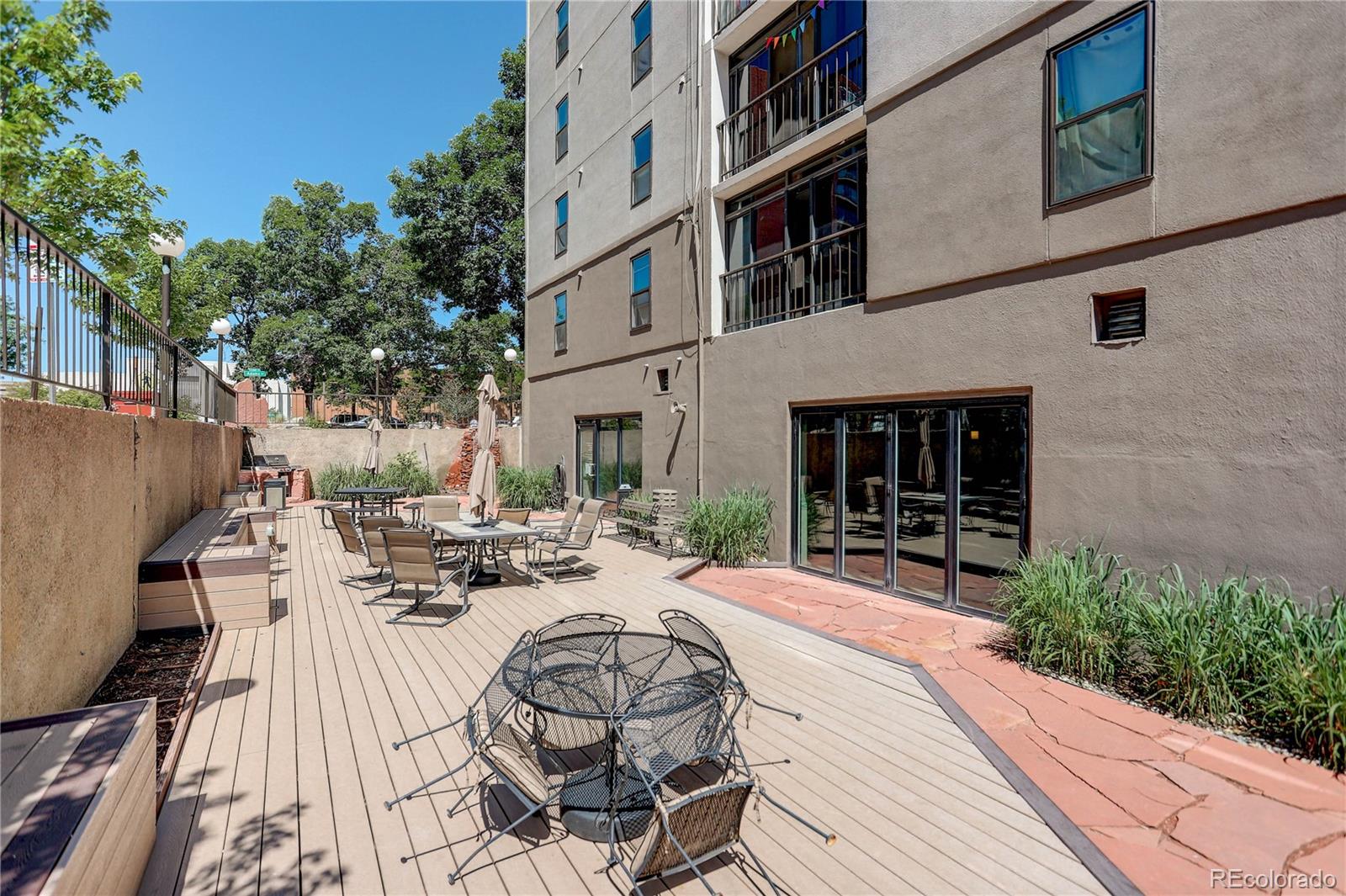 2 Adams Street, Unit 1401 Denver, CO 80206 - Photo 21 of 21 a view of a backyard with sitting area