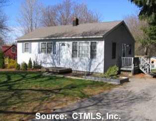 1251 Woodtick Road Wolcott, CT 06716 - Photo 1 of 1 a view of a house with backyard and sitting area