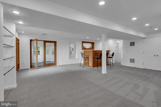 an empty room with windows