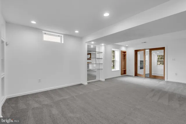 a view of a chairs and table in a backyard