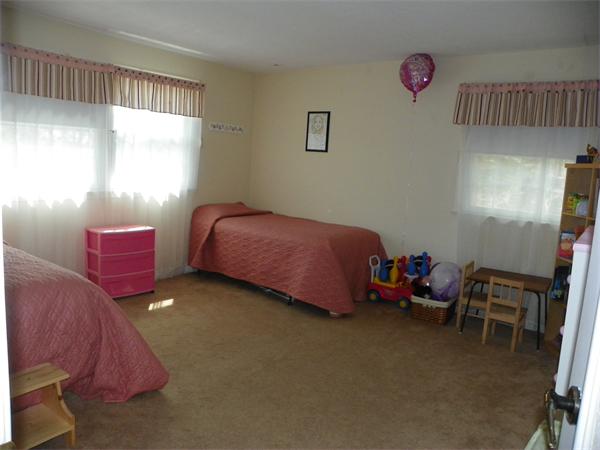 50 Algonquin Road Canton, MA 02021 - Photo 16 of 26 a bedroom with bed and a window