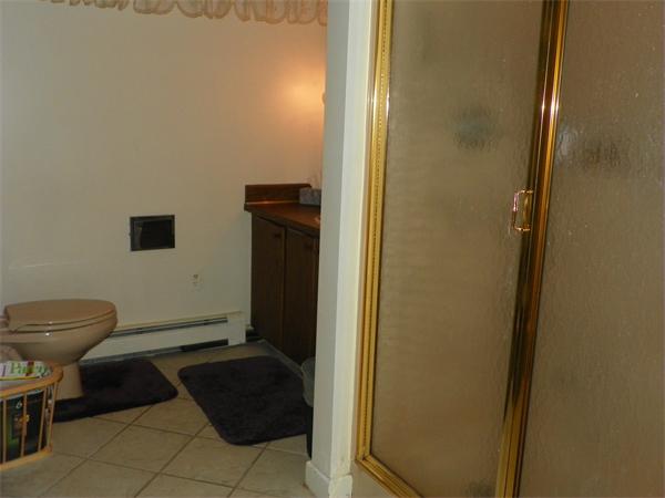 50 Algonquin Road Canton, MA 02021 - Photo 22 of 26 a bathroom with a toilet