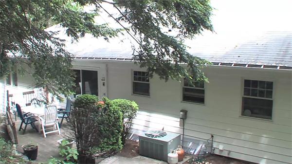 50 Algonquin Road Canton, MA 02021 - Photo 26 of 26 a front view of a house with garden