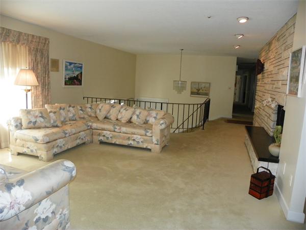 50 Algonquin Road Canton, MA 02021 - Photo 5 of 26 a living room with furniture and a flat screen tv