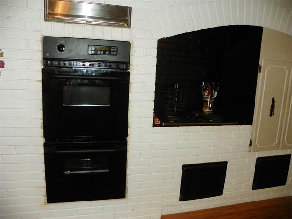 50 Algonquin Road Canton, MA 02021 - Photo 9 of 26 a kitchen with stainless steel appliances a stove and a microwave