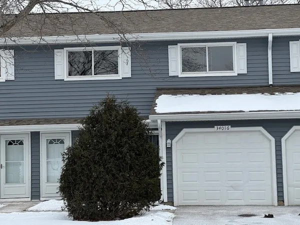 a view of house with outdoor space