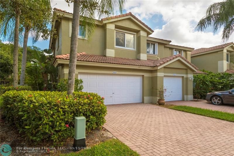 Welcome Home to the Fairways of Heron Bay with Pavered Driveway and Walkway!