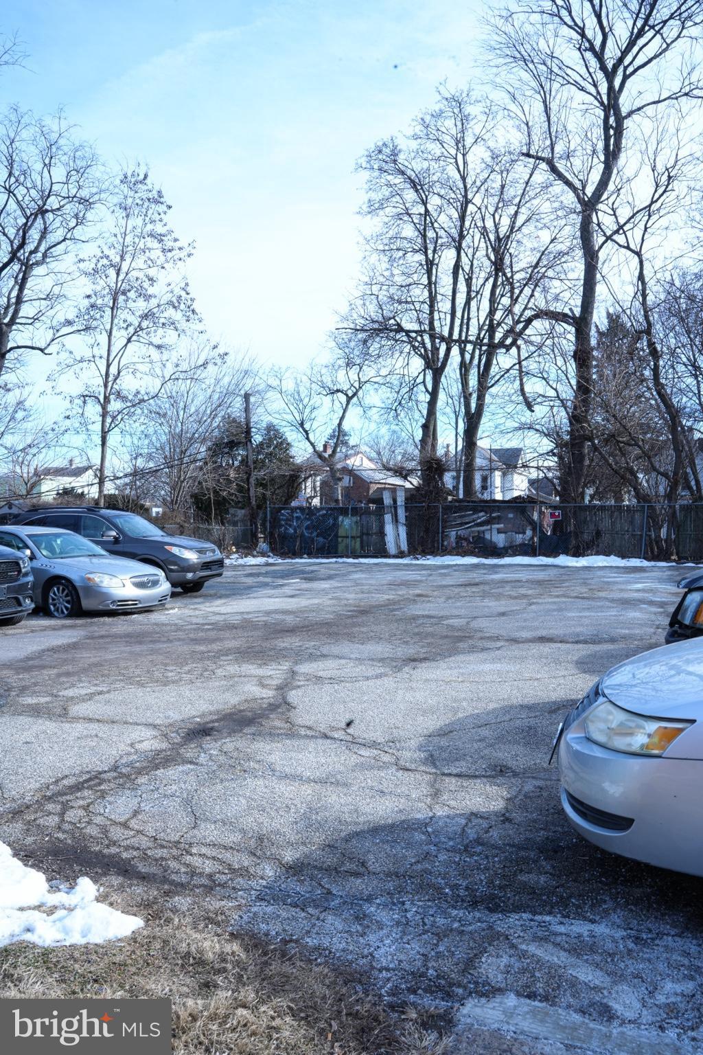 5711 Erdrick Street, Unit 3 Philadelphia, PA 19135 - Photo 18 of 18 a street view with large trees