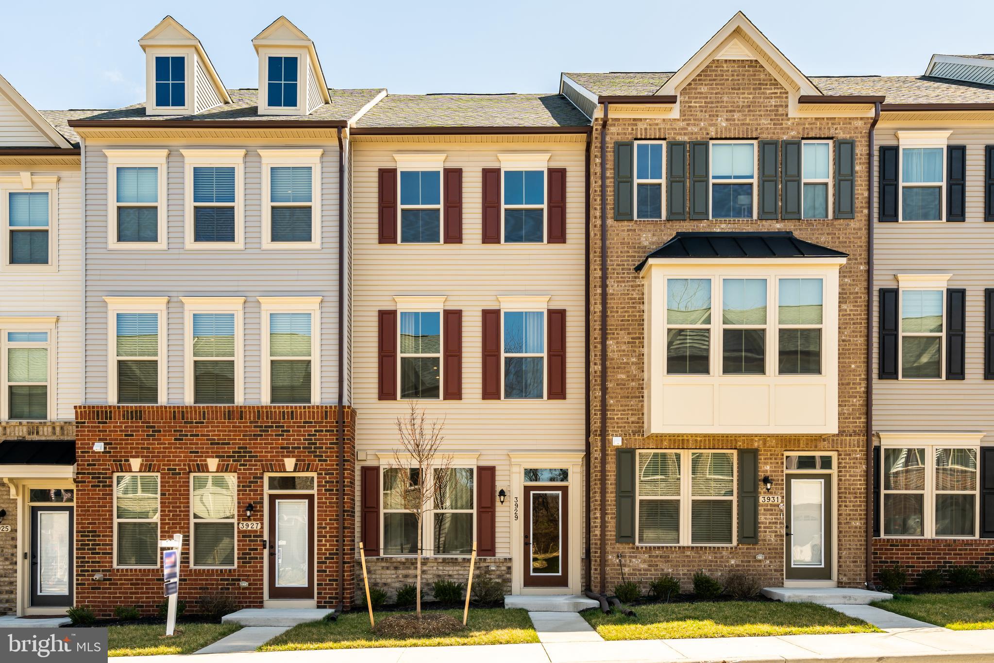 a front view of a building with garden