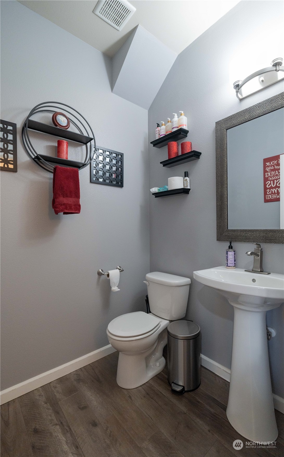 4731 Rosa Court Lacey, WA 98503 - Photo 14 of 31 a bathroom with a toilet sink and mirror