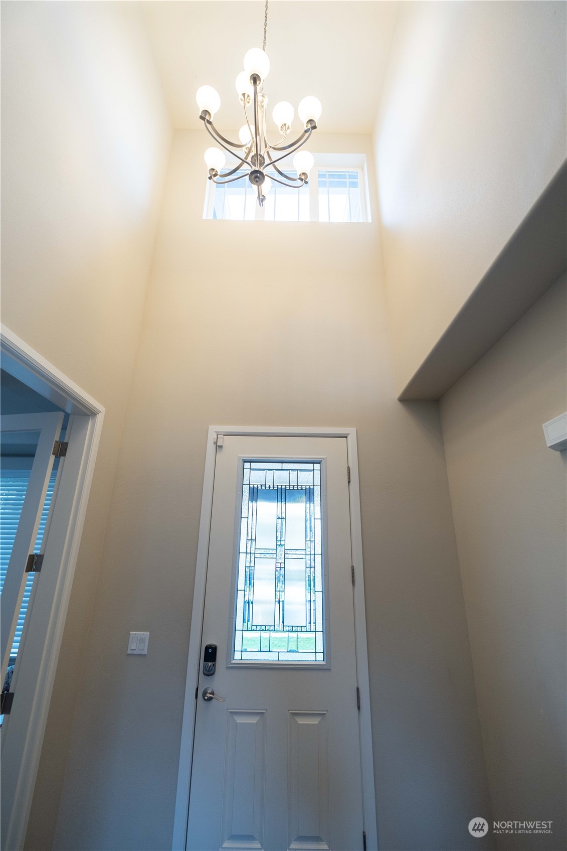 4731 Rosa Court Lacey, WA 98503 - Photo 15 of 31 a view of a room with rack and chandelier fan