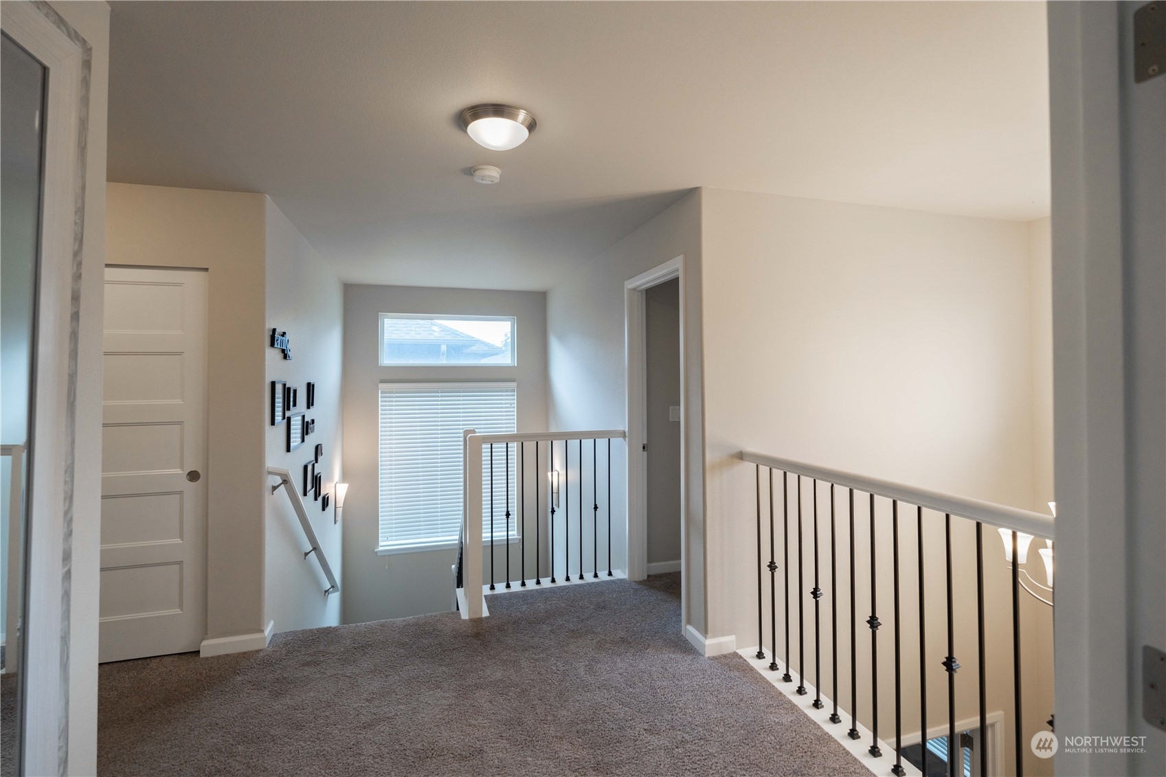 4731 Rosa Court Lacey, WA 98503 - Photo 24 of 31 a view of a hallway with a livingroom