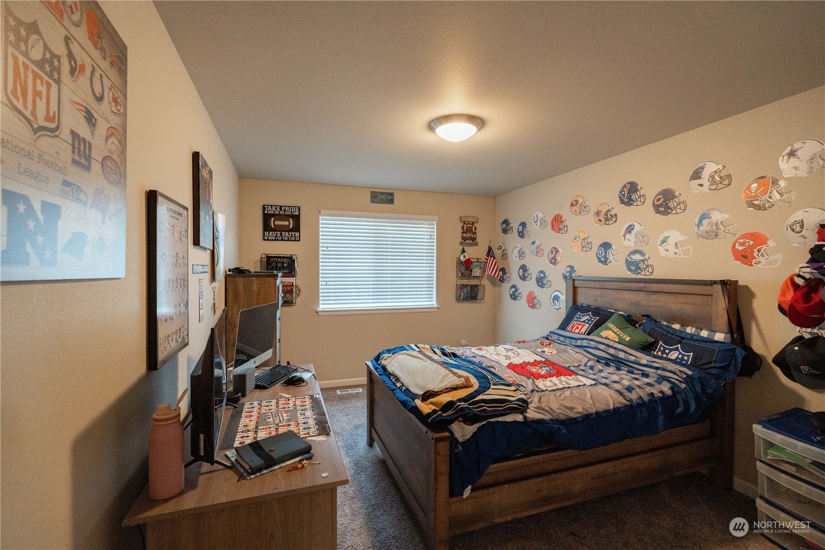 4731 Rosa Court Lacey, WA 98503 - Photo 27 of 31 a bedroom with a bed and a tv